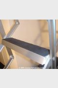 Concertina Loft Ladder featuring rubber coated non slip, extra deep treads